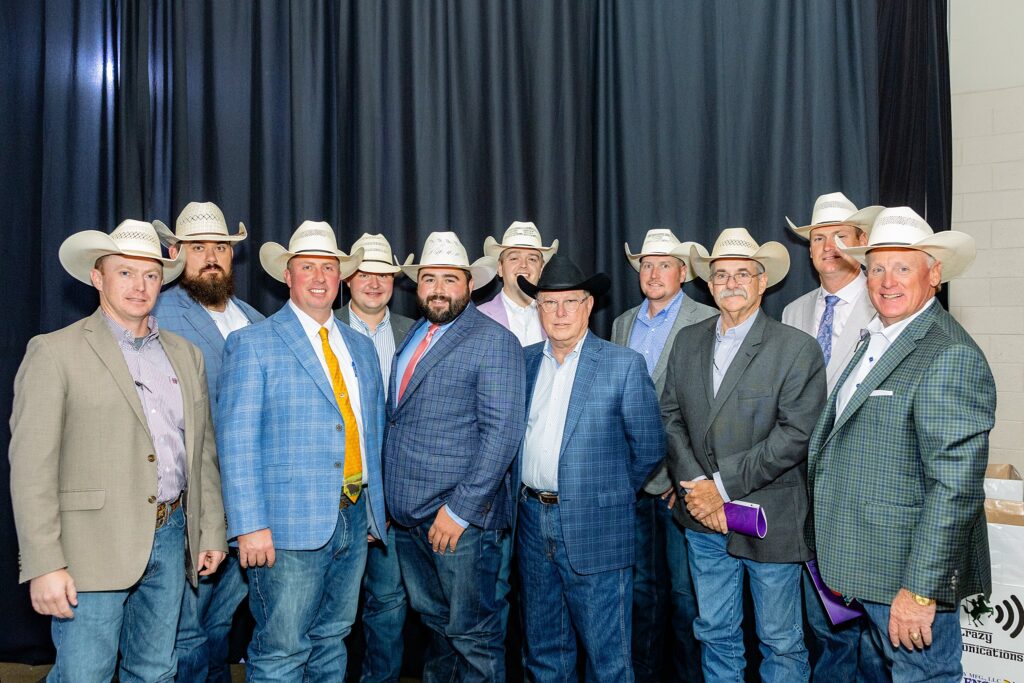 Auction staff at the Boots and Bling event, group of all of the cowboy volunteers.